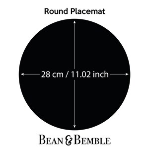 May include: Round black placemat with the text "Round Placemat" and "BEAN & BEMBLE" printed on it. The placemat measures 28 cm / 11.02 inches in diameter.