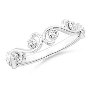 May include: A delicate silver band ring with a swirling design and four small round diamonds.