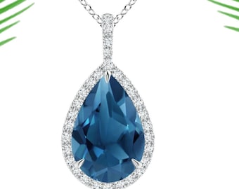 London Blue Topaz Teardrop Pendant: 925 Sterling Silver, White Topaz Halo
