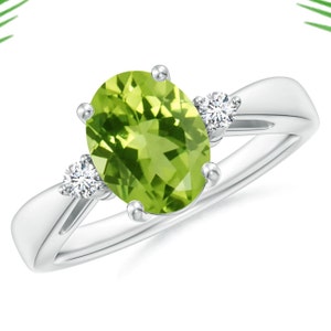 Handmade Peridot Ring: Sterling Silver with White Topaz Accents