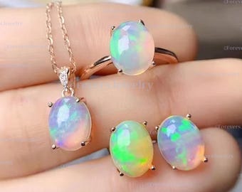Conjunto de joyas de ópalo natural: anillo, colgante y pendientes de plata de ley.