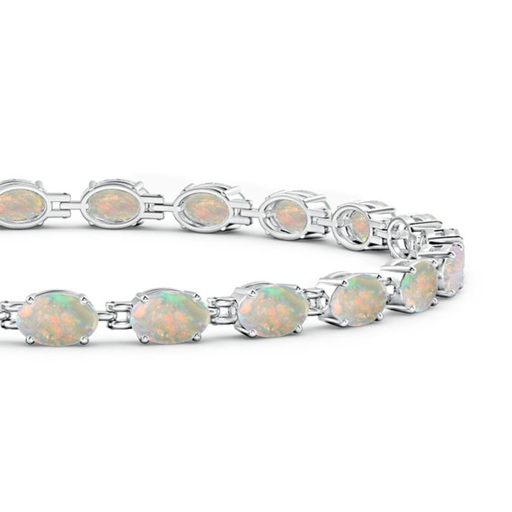 Oval Ethiopian Opal Tennis Bracelet: 925 Sterling Silver