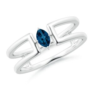 May include: A silver ring featuring a marquise-cut, deep blue gemstone. The ring has a modern design with a split shank and geometric accents. The gemstone is set in a prong setting, and the ring appears to be made of polished metal.