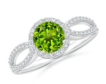 Anillo de peridoto hecho a mano: Plata de ley vintage con brazo dividido y topacio blanco.