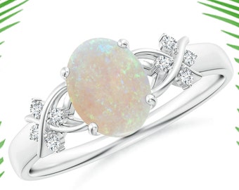 Sterling Silver Oval Opal Ring: Criss Cross White Topaz Accent
