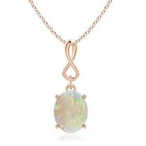 May include: A delicate rose gold necklace featuring an infinity pendant and a large oval opal gemstone.