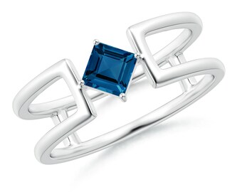 May include: A silver ring featuring a square blue gemstone set in a geometric design.
