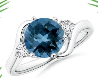 London Blue Topaz Ring: Sterling Silver Three Stone Engagement Ring