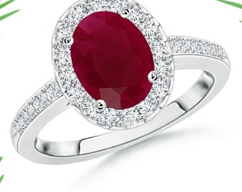 Anello ovale con rubino: dettagli in topazio bianco, argento sterling 925