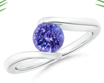 Anillo de compromiso de tanzanita de talla redonda, solitario moderno con montura tipo bypass, anillo de piedra natal de diciembre de inspiración vintage.
