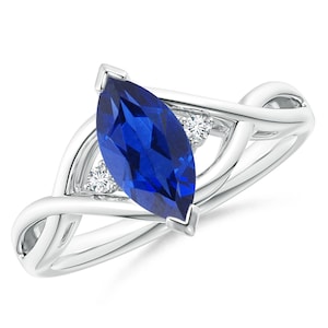 Marquise Blue Sapphire Ring: Criss-Cross Sterling Silver, White Topaz Accents