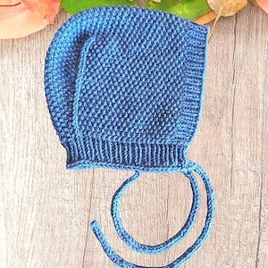 Handmade knitted blue bonnet