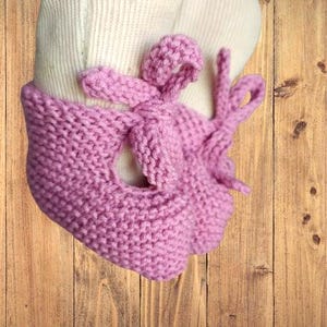 Knitted baby bonnet with booties