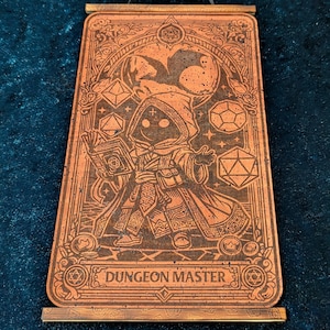 May include: A wooden wall hanging with a copper finish. The design features a cartoon wizard holding a book, surrounded by geometric shapes and the text "DUNGEON MASTER". The artwork is framed by decorative borders and has wooden rods at the top and bottom for hanging.