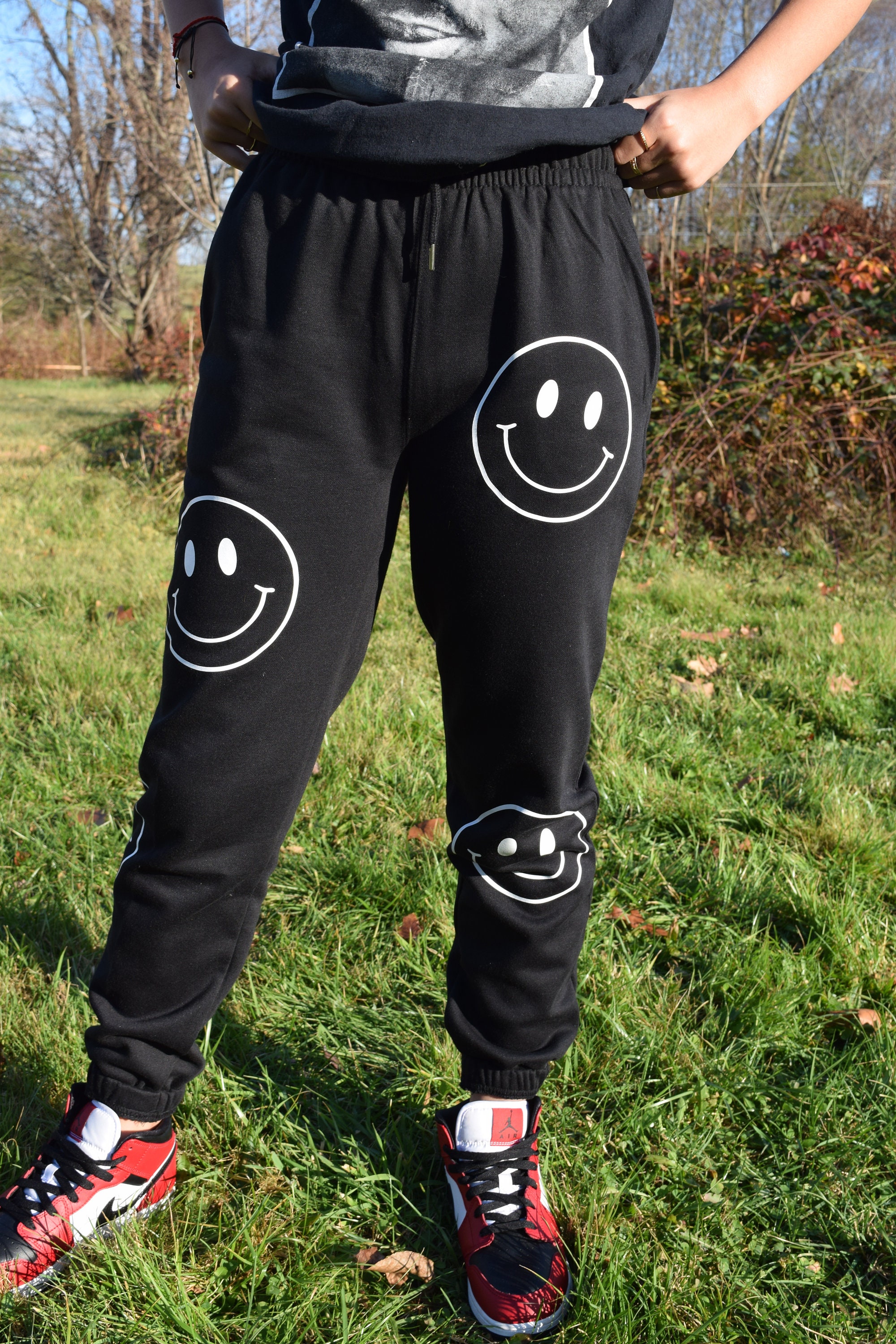 sweatpants with smiley face