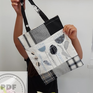 Shopper bag patchwork con motivi appliquè e ricami a mano. Tutorial illustrato con tecniche di cucito e ricamo per Imparare a realizzarla.