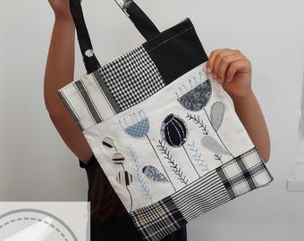 Patchwork-Shopper mit Applikationsmotiven und Handstickerei. Illustriertes Tutorial mit Näh- und Sticktechniken zum Erlernen der Herstellung.