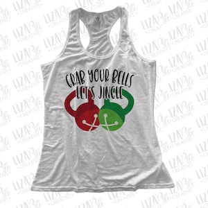 May include: White racerback tank top with the text "Grab Your Bells Let's Jingle" above a graphic of a red and green bell. The tank top is a festive holiday apparel item.