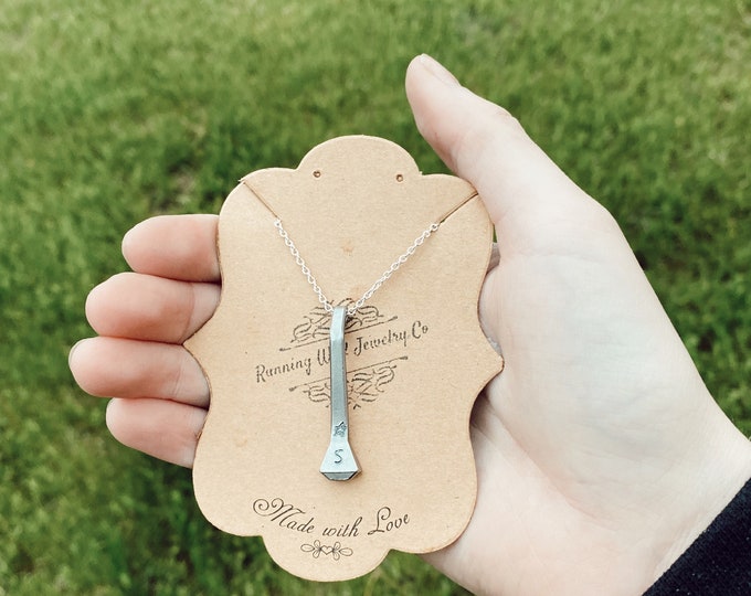Stamped initial horseshoe nail necklace