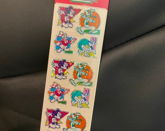 ミッキーとミニーマウスのサンディライオンプリズマティックバースデー