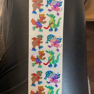 Vintage Sandlöwe Aufkleber - Tiere spielen Sport Prisma