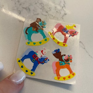 Sandylion sticker mod - vintage kromekote rocking horses