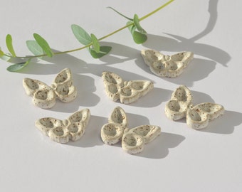 Tiny empty butterfly paint pans x 2. Speckled stoneware.