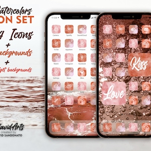 May include: Two iPhone mockups displaying a set of 544 watercolor icons, 15 backgrounds, and 42 widget backgrounds. The icons are in shades of pink and brown with white outlines. The text "Watercolors ICON SET 544 Icons + 15 backgrounds + 42 Widget backgrounds" is displayed above the mockups. The text "Love" and "Kiss" are displayed on two of the icons.