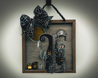 これはハロウィーンの額入りアートです