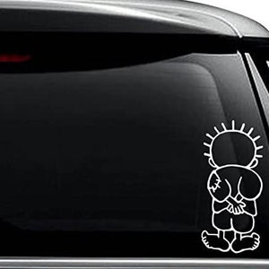 May include: White vinyl decal of a cartoon character with a mohawk, arms crossed, and a stitched-up arm. The character is standing on a black background.