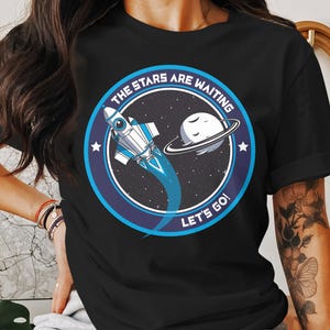 Space Adventure T-Shirt - The Stars Are Waiting Graphic Tee - Sci-Fi Outer Space Art - Unisex Cosmic Galaxy Shirt - Astronaut Fan Gift