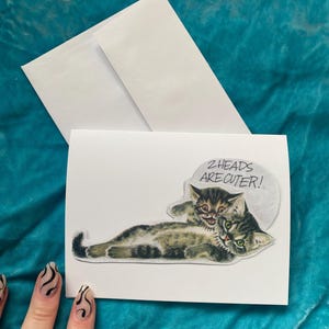 Carte de voeux vierge avec collage de 2 têtes de chat