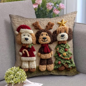 May include: A decorative pillow featuring three dog characters dressed for Christmas. One dog wears a Santa hat and coat, another has reindeer antlers and a scarf, and the third is a Christmas tree. The pillow is beige.
