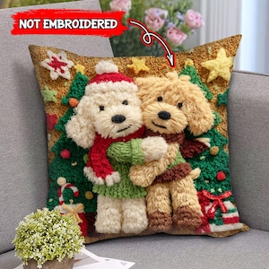 May include: A decorative Christmas pillow featuring two hugging dog figures. One dog wears a red and white Santa hat and scarf, the other a green sweater and brown scarf. The background includes Christmas trees, stars, and gift boxes.