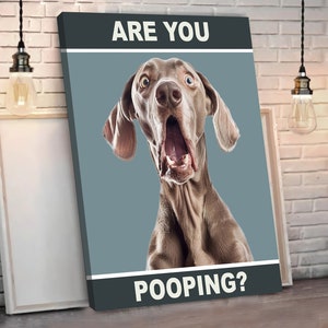 May include: A humorous canvas print featuring a surprised-looking dog with the text "ARE YOU POOPING?" in white letters on a dark gray background.