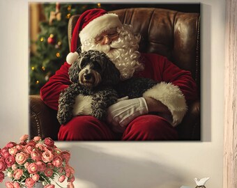 May include: Santa Claus in a red suit and white beard is sitting in a brown leather armchair with a black dog in his lap. The dog is looking at the camera. There is a Christmas tree in the background.