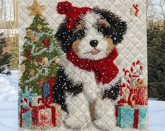 May include: A decorative Christmas garden flag featuring a puppy wearing a red hat and scarf, surrounded by a Christmas tree, presents, and falling snow. The flag has a quilted pattern and a star on top of the tree.