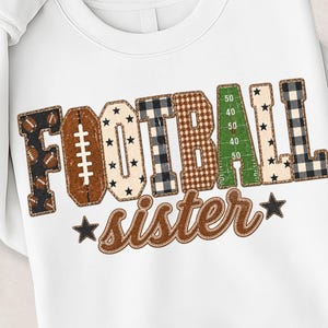 May include: A white crewneck sweatshirt featuring the text FOOTBALL in large, patterned block letters with various designs including footballs, stars, plaid, and a green field graphic, with the word sister in brown cursive script below.