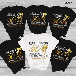 May include: A collection of black and white t-shirts with tropical graphics and text. The shirts feature phrases like "Mark's 50th Birthday Crew Punta Cana 2025" and "I'm Bringing the 50 Reasons for the Party in Punta Cana 2025".