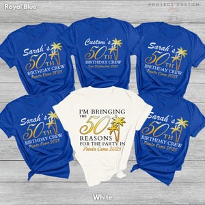 May include: A collection of blue and white t-shirts with gold text and graphics. The shirts feature phrases like "Sarah's 50th Birthday Crew" and "I'm Bringing the 50 Reasons for the Party in Punta Cana 2025."