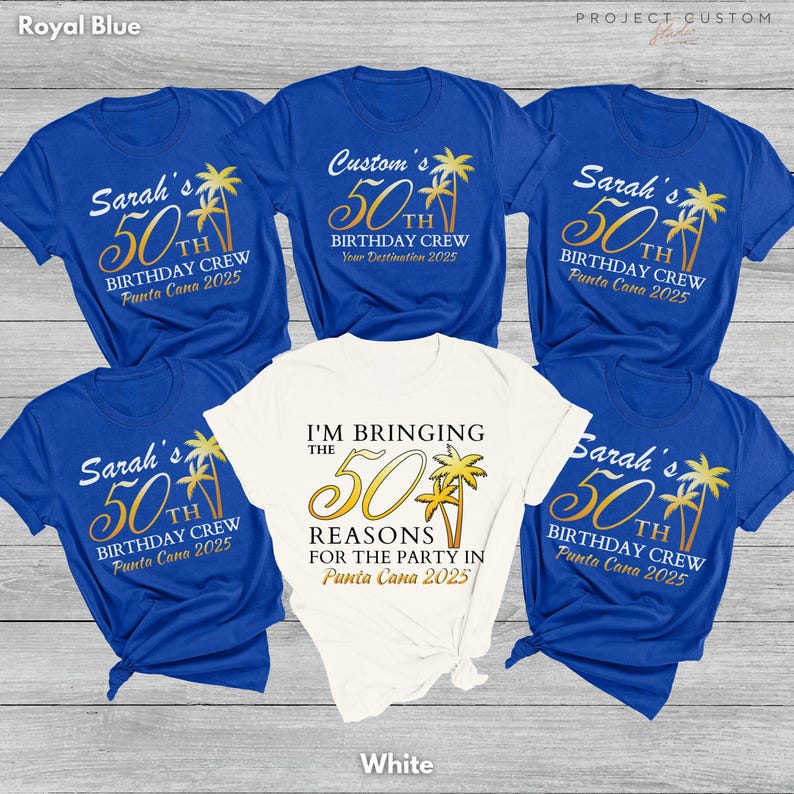 May include: A collection of blue and white t-shirts with gold text and graphics. The shirts feature phrases like "Sarah's 50th Birthday Crew" and "I'm Bringing the 50 Reasons for the Party in Punta Cana 2025."