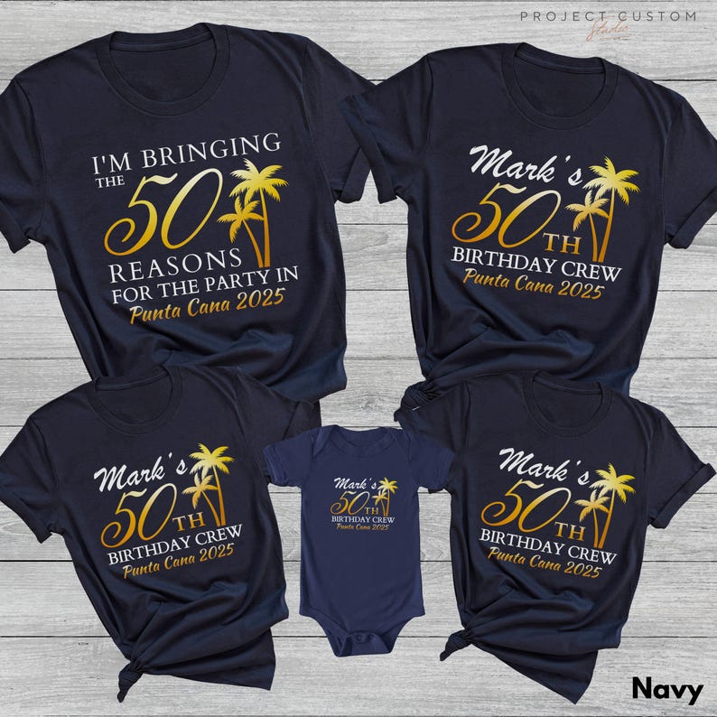 May include: Navy blue t-shirts and a onesie with gold and white text. The shirts read "I'm Bringing the 50 Reasons for the Party in Punta Cana 2025" and "Mark's 50th Birthday Crew Punta Cana 2025".