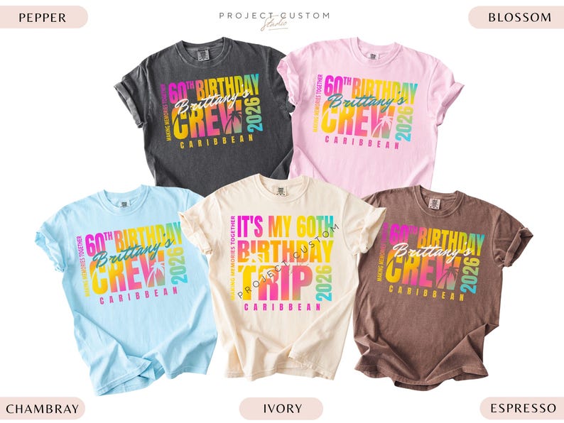 May include: Five short-sleeved t-shirts in various colors: charcoal, light pink, light blue, ivory, and brown. Each shirt features a colorful graphic that reads "60th Birthday Brittany's Crew Caribbean 2026."