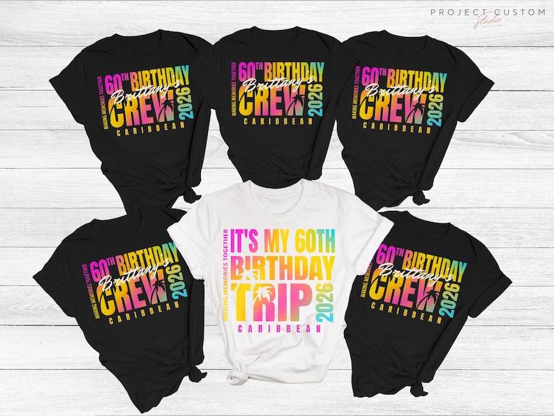 May include: A collection of black and white t-shirts with colorful text. The shirts feature the phrases "60th Birthday Crew Caribbean 2026" and "It's My 60th Birthday Trip Caribbean 2026". The shirts are likely for a group celebrating a 60th birthday.
