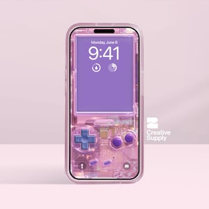 May include: A transparent phone case with a retro video game design. The case has a purple screen displaying "Monday, June 6, 9:41". The case features a cross-shaped directional pad, purple buttons, and other game-like details. The case is on a pink background.