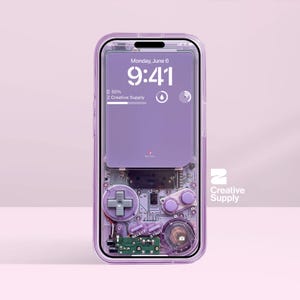 May include: A transparent purple phone case with a retro video game design. The phone screen shows the time as 9:41 AM on Monday, June 6th. The case has a cross-shaped directional pad, buttons, and the text "SELECT" and "START".