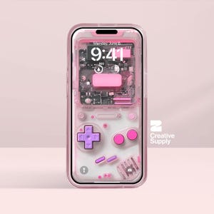 May include: A transparent phone case with a pink retro video game design. The case has a D-pad, buttons, and internal components visible. The phone screen shows the time and date. The case is a fun, nostalgic accessory.