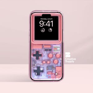 May include: A pink phone case with a retro video game design. The case has a clear border and features a directional pad, buttons, and other game elements. The phone screen displays "Monday, June 6, 9:41". The Creative Supply logo is visible.