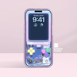 May include: A transparent phone case with a retro video game design. The case has a lilac border and features a D-pad, coloured buttons, and a camera cutout. The phone screen displays the time and date. The Creative Supply logo is visible.