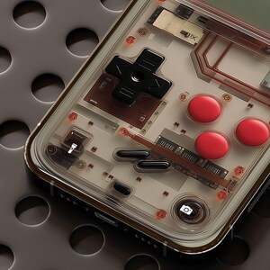 May include: A clear phone case with a retro video game design. The case has a black and red color scheme and features a directional pad, buttons, and a screen. The case is designed to look like a vintage handheld game console.